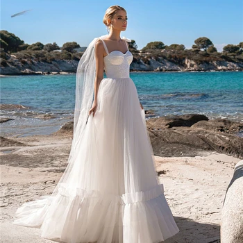 תחרה שמלות חוף חתונה עם קשת רצועות ספגטי מחוך הכלה שמלה סקסית מתוקה בוהו מסיבת חתונה שמלות 2023